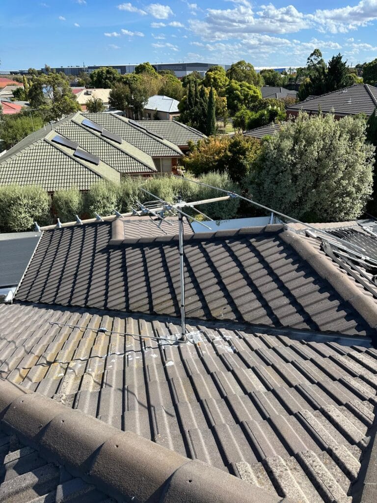 Old analogue TV antenna installed on residential roof in Melbourne before digital upgrade
